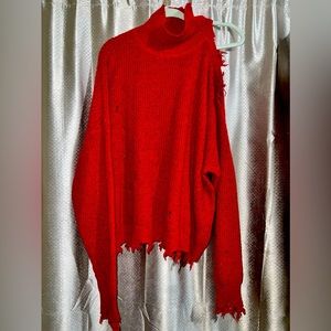 Zoe a a large cold shoulder sweater